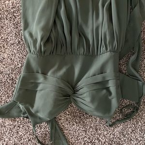 Eucalyptus A0 dress. Loved it. No damage worn once. Two ties in back.